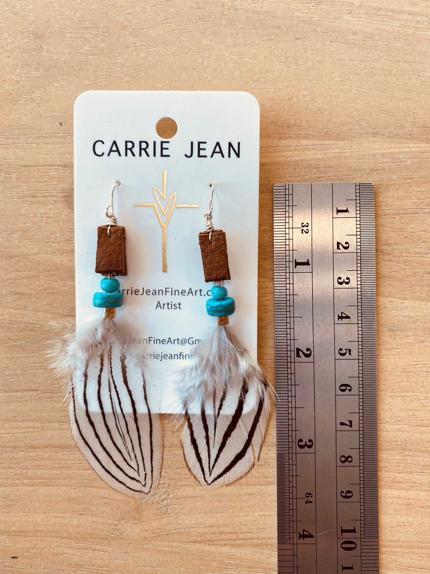 Leather, feathers & beaded earring