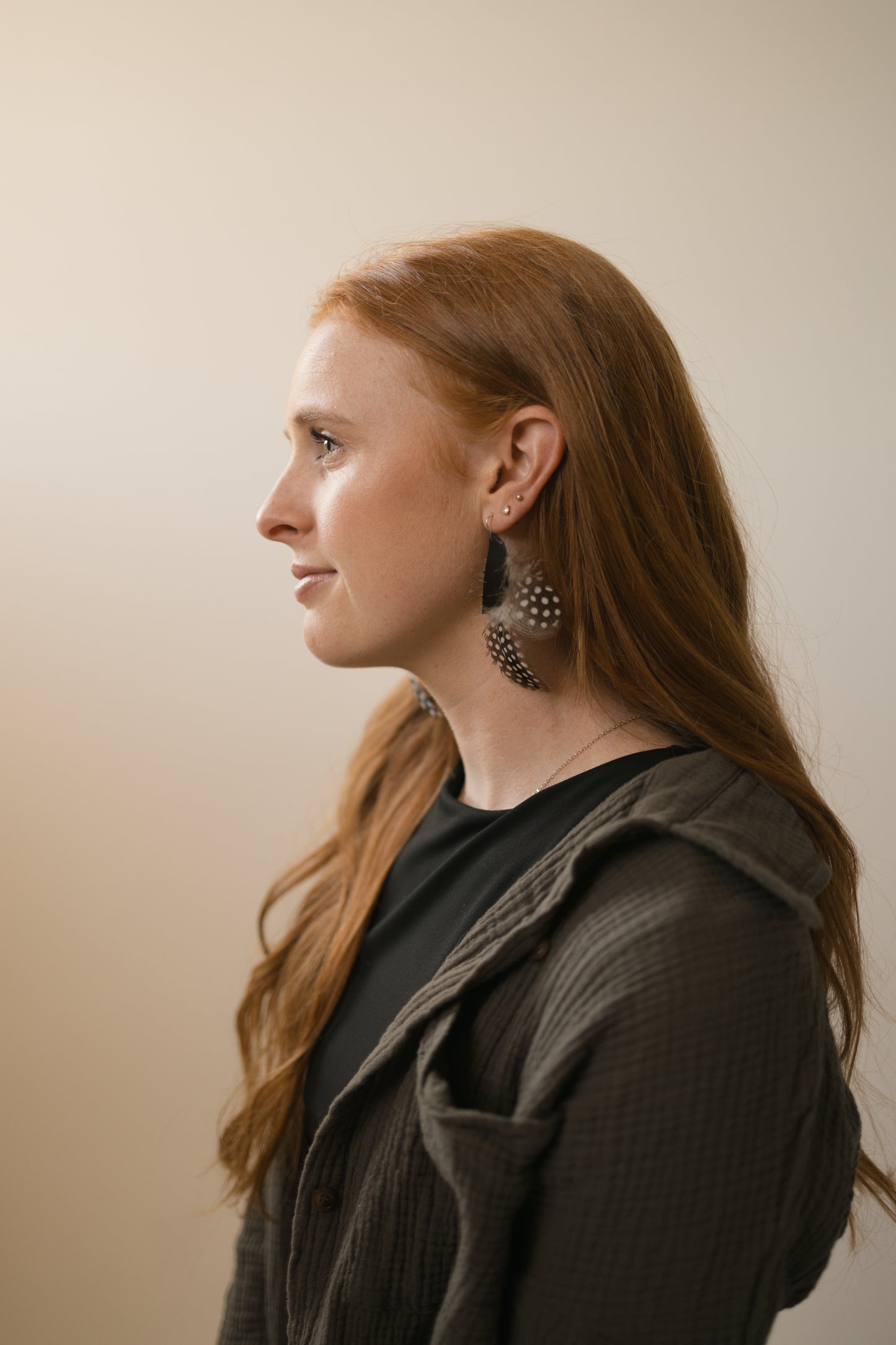 Half moon leather & feather earrings