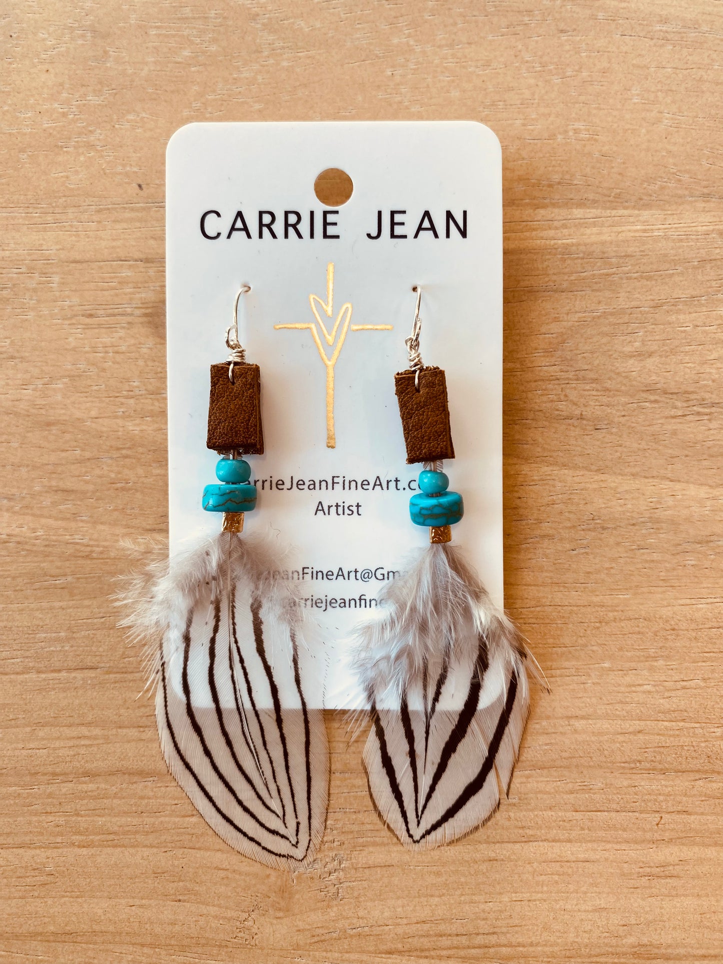 Leather, feathers & beaded earring